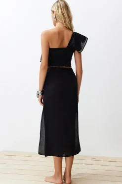 Conjunto top asim&eacute;trico y falda