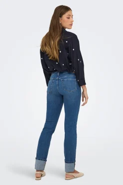 Jeans slim bajo vuelto