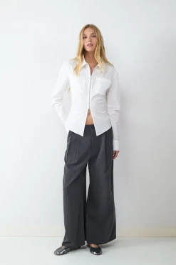 Pantalón traje pliegues