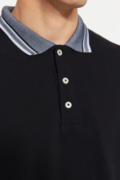Polo detalle cuello y mangas