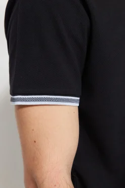 Polo detalle cuello y mangas