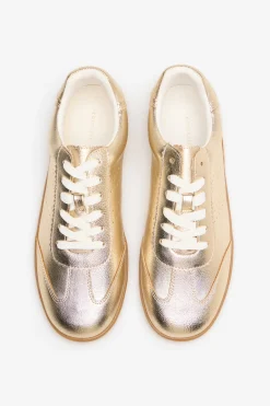 Zapatilla dorada