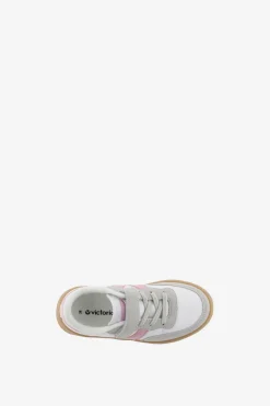 Zapatillas deportivas de ni&ntilde;os con piezas en contraste y cord&oacute;n el&aacute;stico